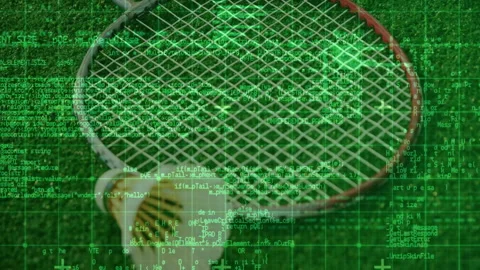 Badminton racket head lying face-up on grass, featuring shuttlecock and digital Stock Footage 307460495