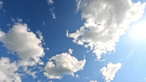 Badminton shuttlecock hit with racket into blue sky Stock Footage 317888452