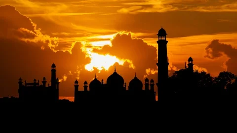 Badshahi Mosque: Time Lapse at Sunset with Red Sun and Clouds, Lahore, Pakistan Stock Footage 106995561