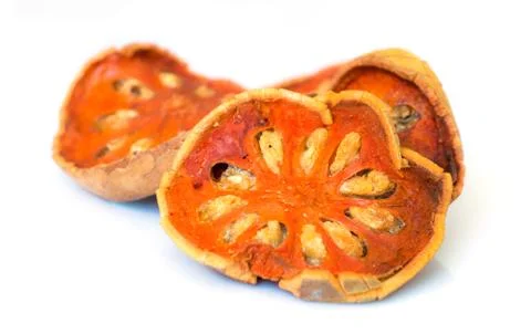 Bael dry fruit for tea on white background Stock Photos