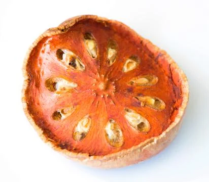 Bael dry fruit for tea on white background Stock Photos