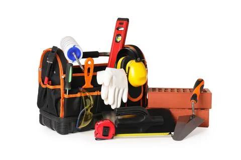 Bag with construction tools and building materials isolated on white Fotos de archivo