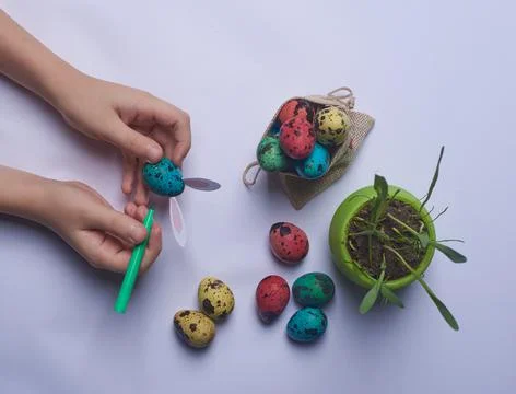 A bag of Easter eggs and a pot of weed Stock Photos
