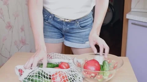 A bag of fresh vegetables, cucumbers and tomatoes Stock Footage 160004365