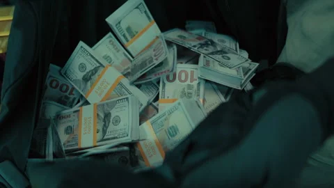 A bag full of $100 bills Stock Footage 262502995