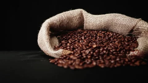 Bag full of coffee beans with pan camera movement wide shot Stock Footage 208757945