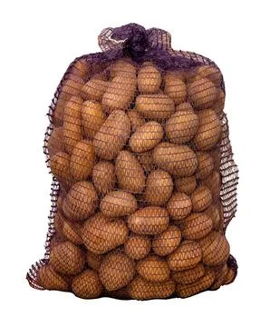 Bag of potatoes on white background. Isolate of mesh bag with potatoes Stock Photos