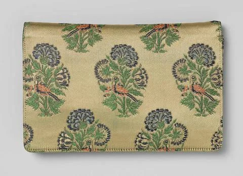 Bag in a rectangular model with flap, from green yellow brocade with a pat... Stock Photos