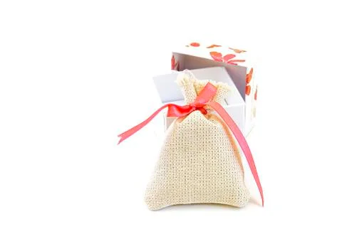 Bag with red ribbon . Stock Photos