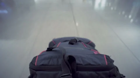 Bag through an airport Stock Footage 39399320