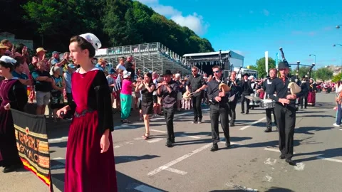 Bagad and dancers performing during the Cornouaille festival of Quimper Stock-Footage 209166957