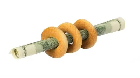 Bagels with dollars Stock Photos