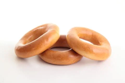 Bagels from a wheat on a white Stock Photos