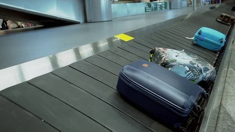 Baggage Bags Moving On Arrival Baggage Belt In Airport Stock Footage 77620741
