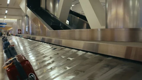 The Baggage Carousel located within the Airports Luggage Claim Area Stock Footage 306191554