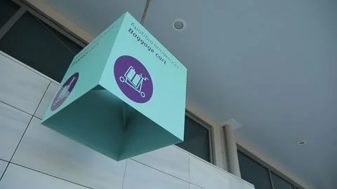 Baggage cart box, violet blue color, airport arrival point. Stock Footage 202093173