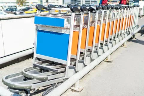 Baggage carts in a row Foto stock