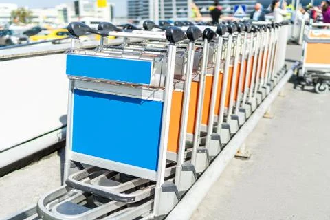 Baggage carts in a row Stock Photos