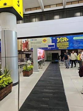 Baggage claim area inside the terminal building at Trivandrum International.. Stock Photos