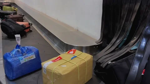 A baggage claim area at Terminal 1 of Soekarno Hatta International Airport. Stock Footage 324734081
