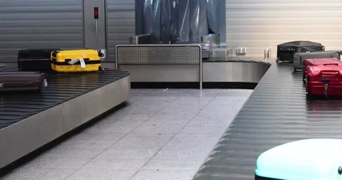 Baggage claim belt on both sides. A pleasant airplane journey Stock Footage 325121580