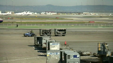 Baggage falls off cart Stock-Footage 96942