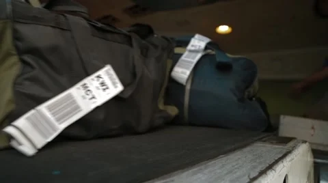 Baggage Handler Loading Suitcases Stock Footage 62203271