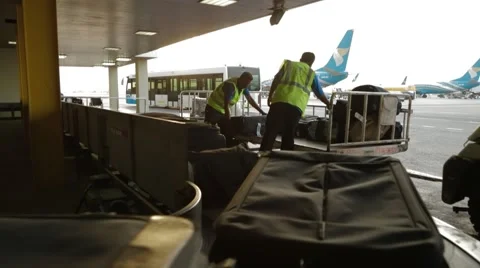 Baggage Handlers Workers Sorting Luggage Stock Footage 62203224