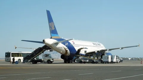 Baggage Loading To The Nile Air Airplane Prepared For The Flight Stock Footage 91806708