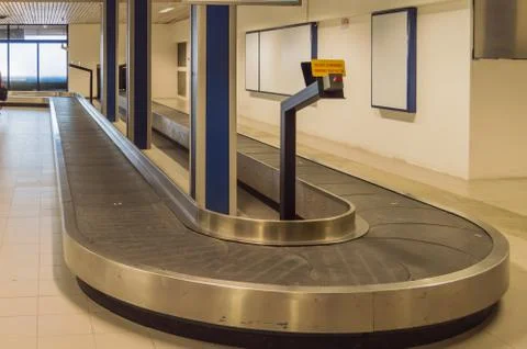 Baggage Transfer Rack and Empty Luggage Stock Photos