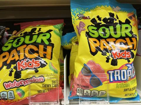 Bagged candy on a. Retail store shelf Sour patch variety Fotos de archivo