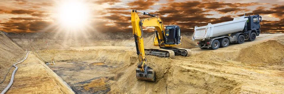 Bagger auf einer Baustelle Bagger auf einer Baustelle Copyright: xZoonar.c... Stock Photos