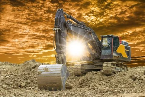 Bagger auf einer Baustelle Bagger auf einer Baustelle Copyright: xZoonar.c... Stock Photos