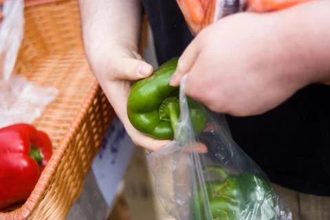Bagging green pepper Stock Photos