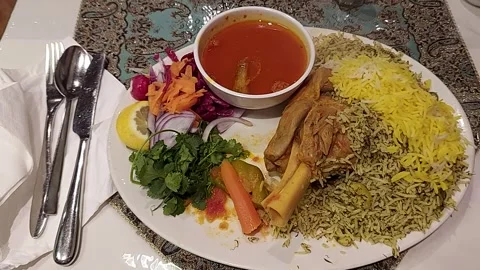Baghali Polo with Lamb Shank - Authentic Persian Cuisine Stock Footage 304645143