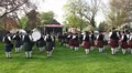 Bagpipe bands playing together at Highland Gathering HD Footage