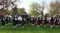 Bagpipe bands playing together at Highland Gathering HD Footage