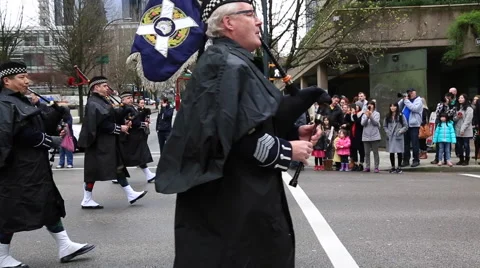 Bagpipe orchestra playing Vancouver Patrick's day Stock Footage 61744388