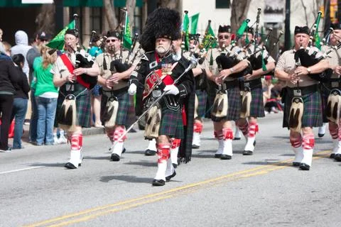 Bagpipes Corps Performs While Marching In St. Patrick's Parade Stock Photos