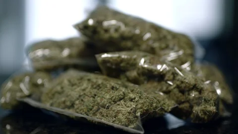 Bags of weed focus rack 스톡 동영상 94353357