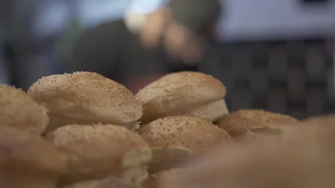 Baguette bread arranged on the table Stock Footage 229186312