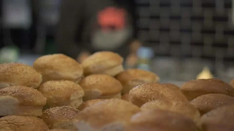 Baguette bread arranged on the table in the kitchen Stock Footage 229186126