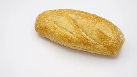 Baguette Bread On White Background Rotated. Stockbeeldmateriaal 251175242