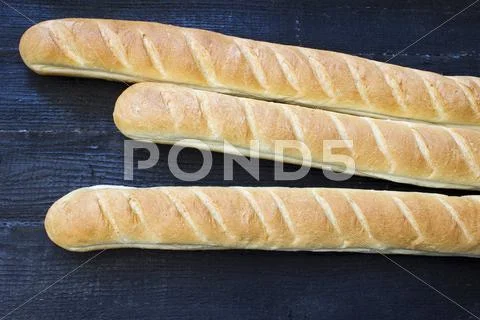 Baguette top view Stock Photos