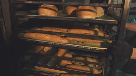 Baguettes and bread on a tray. 動画素材 98531972