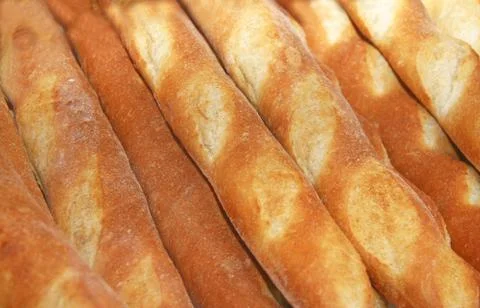 Baguettes behind a window Foto stock