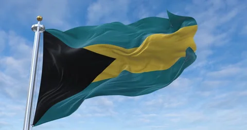 Bahamas flag with flagpole waving in rolling clouds looping, 4K (Perfect Loop) 库存影片 256926086