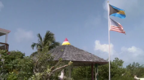 Bahamian &amp; American Flags in the Wind Stock Footage 475700