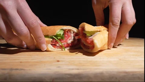 Bahn mi sandwich split opened closeup Stock Footage 126014903