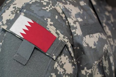 Bahrain army uniform patch flag on soldiers arm. Military Concept Stock Illustration